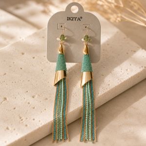 Boucles longues pompons turquoise - bijou Ikita unique